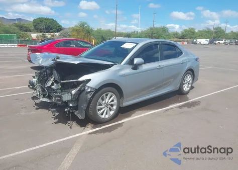 2021 Toyota Camry Le Hybrid from USA, damaged, VIN 4T1C31AK4MU023267